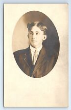 Man in Suit Portrait Handsome Young Parted Hair AZO RPPC Postcard 1904-1918 picture