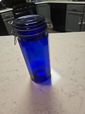 VINTAGE COBALT BLUE 10 INCH TALL GLASS CANISTER WIRE LOCKING LID 12 PANEL JAR picture