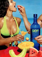Modern magazine beverage AD SKYY MELON VODKA Model by the Sea with melons 061823 picture