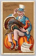 Postcard Thanksgiving Patriotic Uncle Sam Holding Turkey Pumpkin Embossed Gold picture