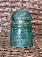 Vintage Aqua Blue Glass Insulator w/ Embossed Star On The Base and stamped 