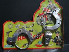 VINTAGE- TOY- POLICE HAND CUFFS & WHISTLE - ON ORIGINAL CARD - JAPAN picture