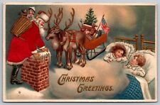 Embossed Christmas Silk Santa Silk Sleigh On Roof Sleeping Children Postcard picture