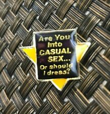 VINTAGE 1980'S SLOGAN ARE YOU INTO CASUAL SEX.. OR SHOULD I DRESS? ENAMEL PIN picture