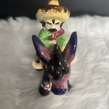 Vintage 4” Spanish Folk Art Porcelain Mexican with Sombrero Riding Purple Donkey picture