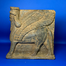 CIRCA NEAR EASTERN STONE LEG OF A CHAIR IN THE FORM OF WINGED FIGURE. picture