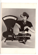 Postcard: Consumer Reports plastic dish testing on food scale, 1950 picture