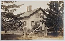 RPPC Beautiful Country Home Wooden Fence Pine Trees Postcard D23 picture