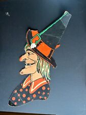 Vintage Halloween Decoration: Profile of a Witch in a Polka Dot Dress picture