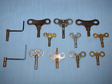 Lot of 12 Antique Clock Key's picture