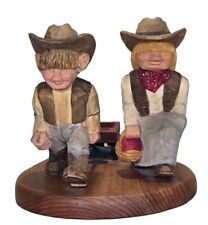 Delightful Norway Hand-Carved Cowboy Girl And Boy Pulling Cart picture