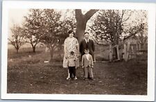 RPPC: Family in yard circa 1926-1940s picture