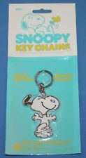 VINTAGE SNOOPY DANCING KEYCHAIN SEALED IN PACKAGE picture