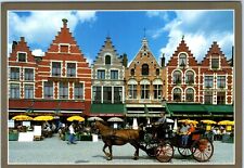 The Market Square, Horse and Buggy Ride Bruges, Belgium Postcard picture