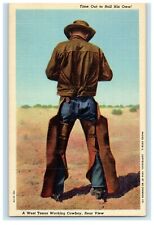 c1940's West Texas Working Cowboy Rear View, Time Out To Roll His Own  Postcard picture