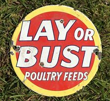 Vintage LAY OR BUST POULTRY FEEDS Porcelain Metal Chicken Farm 6 in Decor Sign picture