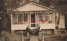 Unknown Location, RPPC, Couple with Dog sitting at their Cottage Home picture