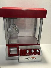 The Claw- Red Toy tabletop Claw Machine for kids with coins. Hours Of Fun picture