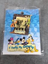 A Family Pin Gathering Goofy And Peter Pan Walt Disney Trading 2004 picture