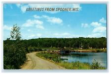 c1960s Scene of Road and River, Greetings from Spooner WI Vintage Postcard picture
