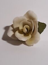 Porcelain White Flower With Green Leaves picture