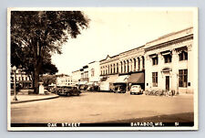 1947 RPPC Oak Street Town Square Cars Bicycles Bank Baraboo WI Postcard picture