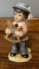 Adorable Brown Haired Boy Holding A Rocking Horse Made By Homco 6” Tall picture