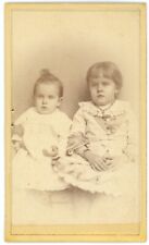 CIRCA 1880'S ADORABLE ANTIQUE CDV  OF TWO SISTERS SITTING IN WHITE DRESSES picture