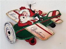 SANTA CLAUS in GREEN AIRPLANE w/ TOYS * Glitter CHRISTMAS ORNAMENT * Vtg Img picture