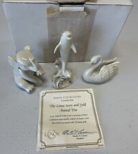 The lenox Ivory and Gold Animal Trio 24k Gold Elephant, Dolphin, Swan picture