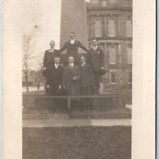 c1910s Group Men Pose RPPC Monument Obelisk Fancy Stone Bldg. Cigar Mansion A213 picture