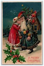 c1910's Christmas Blue Black Robe Santa Claus Sack Of Toys Berries Postcard picture