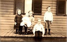 PORTRAIT OF FIVE ADORABLE SIBLINGS ON A FRONT PORCH  : CYKO : RPPC   1911 picture
