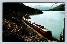 White Pass & Yukon Railway Skirts Shores Historic Lake Bennett, Vintage Postcard picture