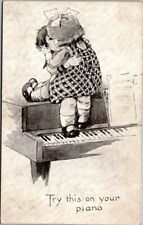 Try This on Your Piano HUMOR Little Boy & Girl Kissing Vintage Postcard B22 picture