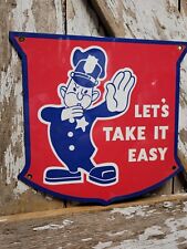 VINTAGE LETS TAKE IT EASY SIGN OLD FORD DEALER ADVERTISING POLICE GUARD SHIELD picture
