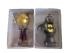 Both Eaglemoss Superman Holding Daily Planet Globe and Batman Bat Signal Figures picture