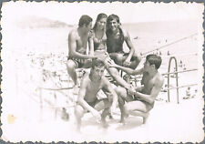 1950s Beautiful boys and girls in bathing suits on the beach Vintage photo picture
