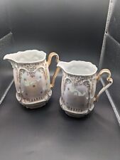 Vintage German Iridescent Gold Handle Set Of Porcelain Pitchers picture
