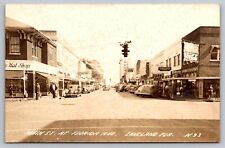 Postcard RPPC Main St at Florida Ave Intersection Storefronts Lakeland Florida picture