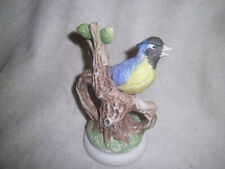 Blue Bird on tree. White base  About 6 1/2 inches tall picture