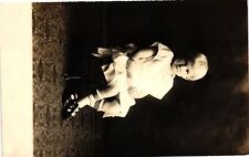 VTG Postcard- A young boy sitting. Early 1900s RPPC picture