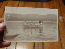 2 vintage REAL PHOTO POSTCARDS people in boat, people on stoop picture