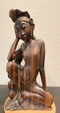 Balinese Wood Carving Indonesian Beauty With Children picture