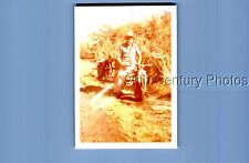 FOUND COLOR PHOTO O+1583 MAN IN HAT SITTING ON MOTORCYCLE picture