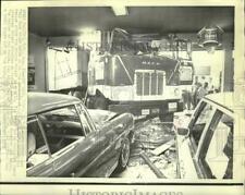 1971 Press Photo Mack truck crashes into North Carolina auto dealership picture